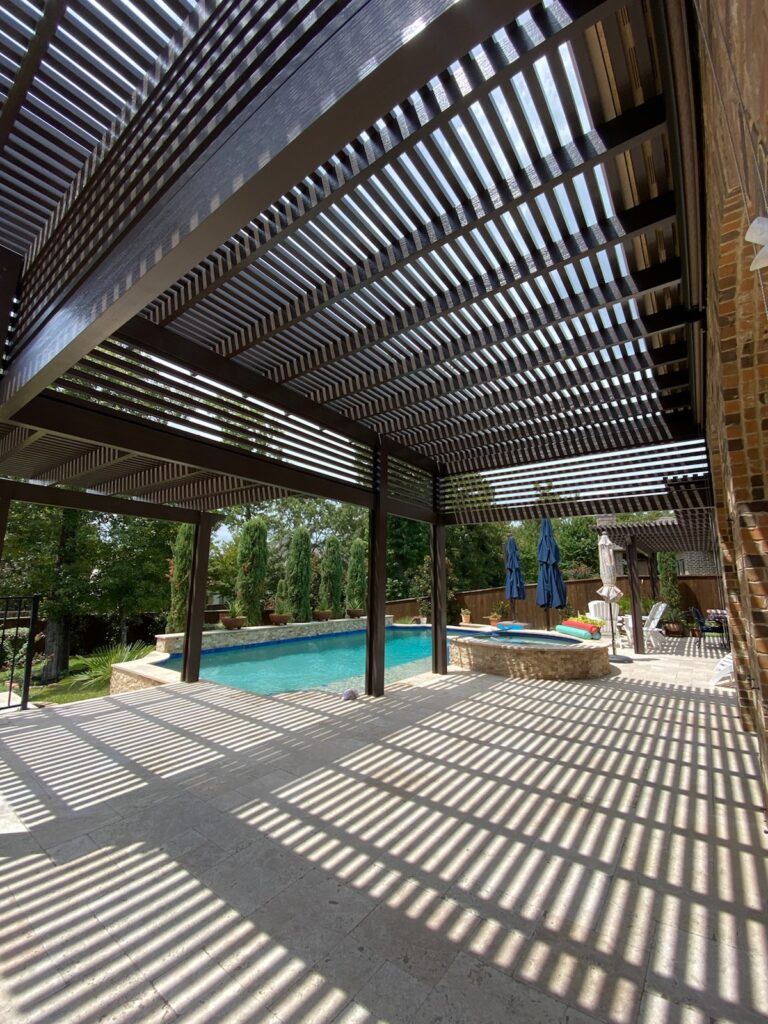 Poolside patio cover made of Aluminum shading this patio located in Katy, TX. Poolside patio cover made of Aluminum shading this patio located in Katy, TX.