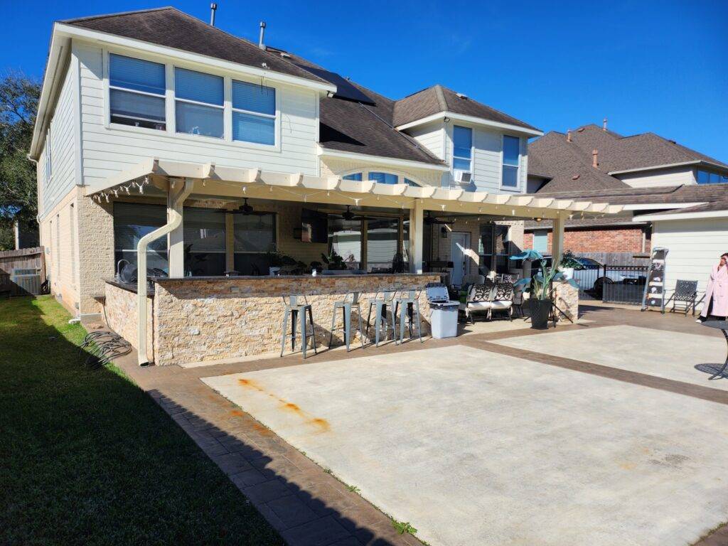 Outdoor covered patio attached to home in Houston